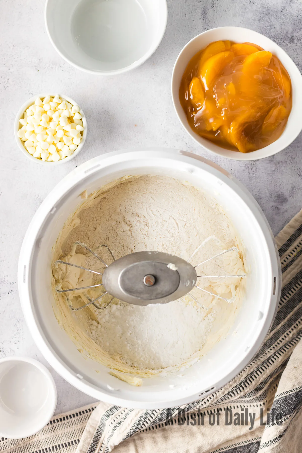 flour, powdered sugar added to mixed butter