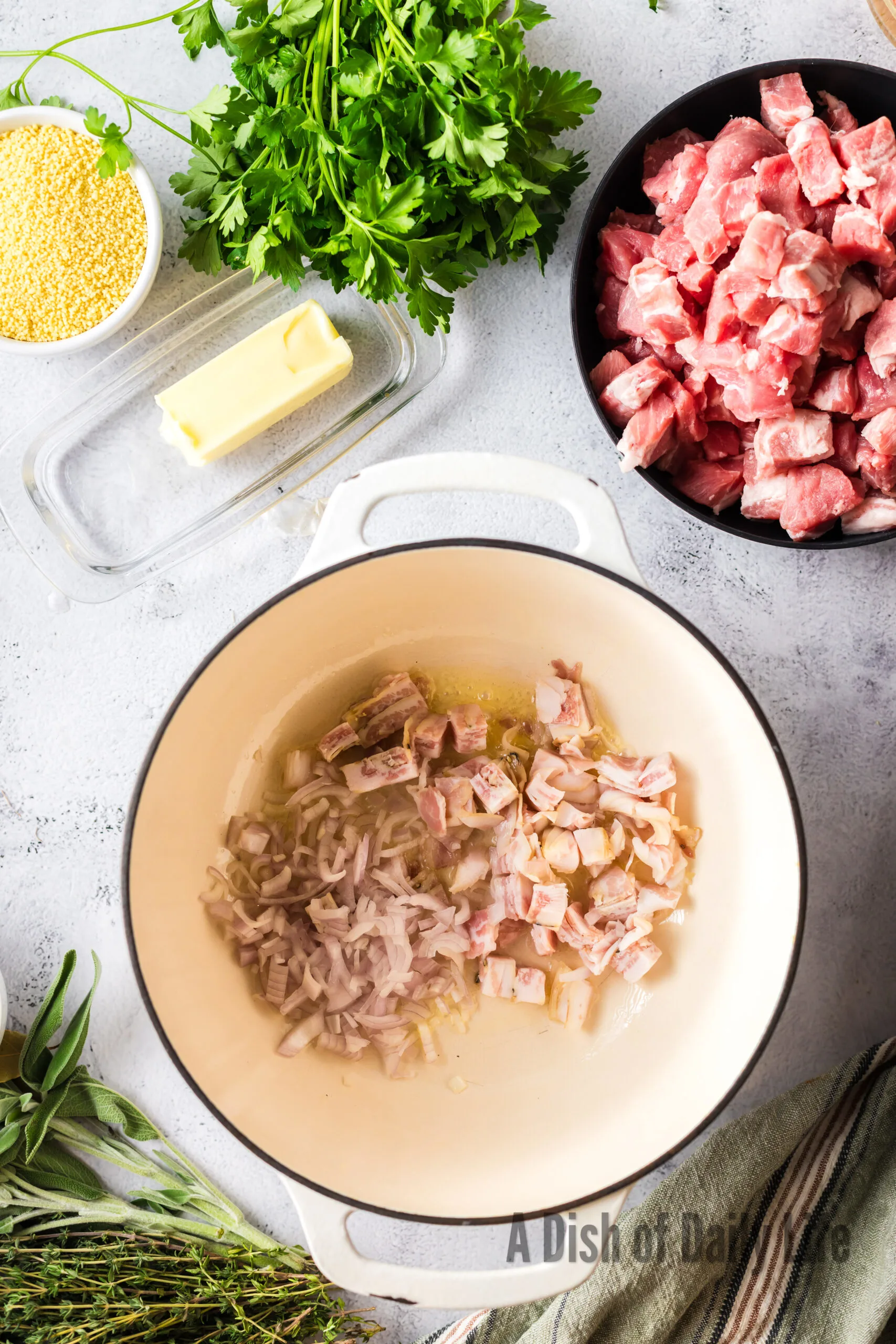 olive oil, panchetta and shallots added to a dutch oven.