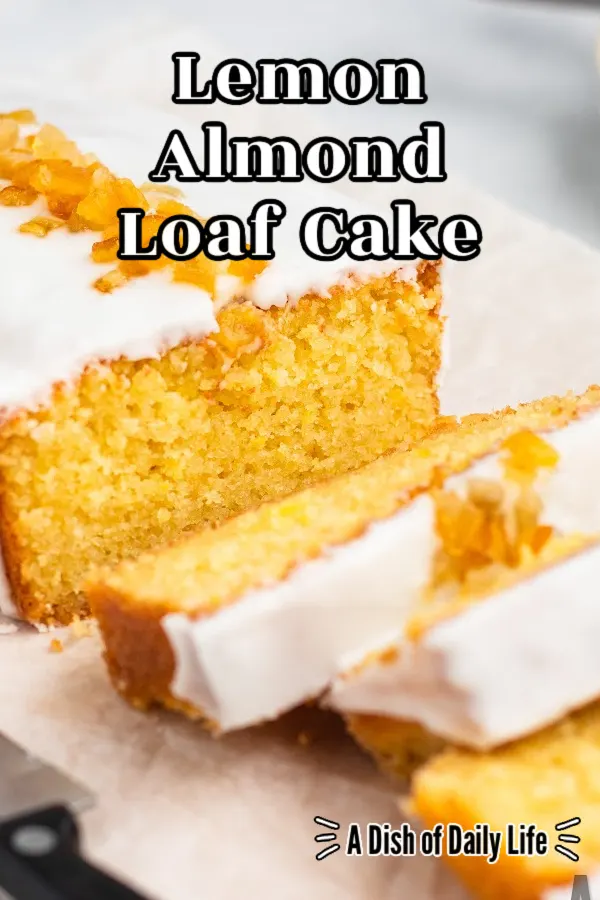Main image for Lemon Almond Loaf Cake. Side view of cake with slices cut.