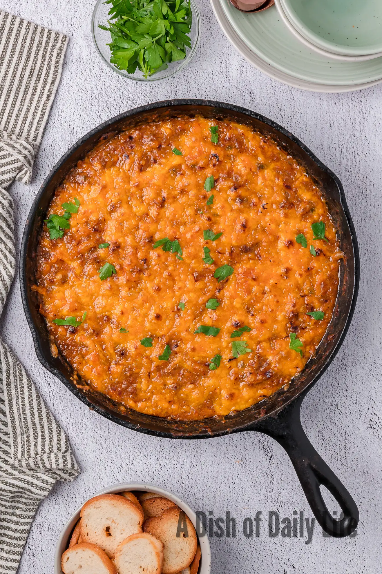 Baked dip in skillet ready to serve