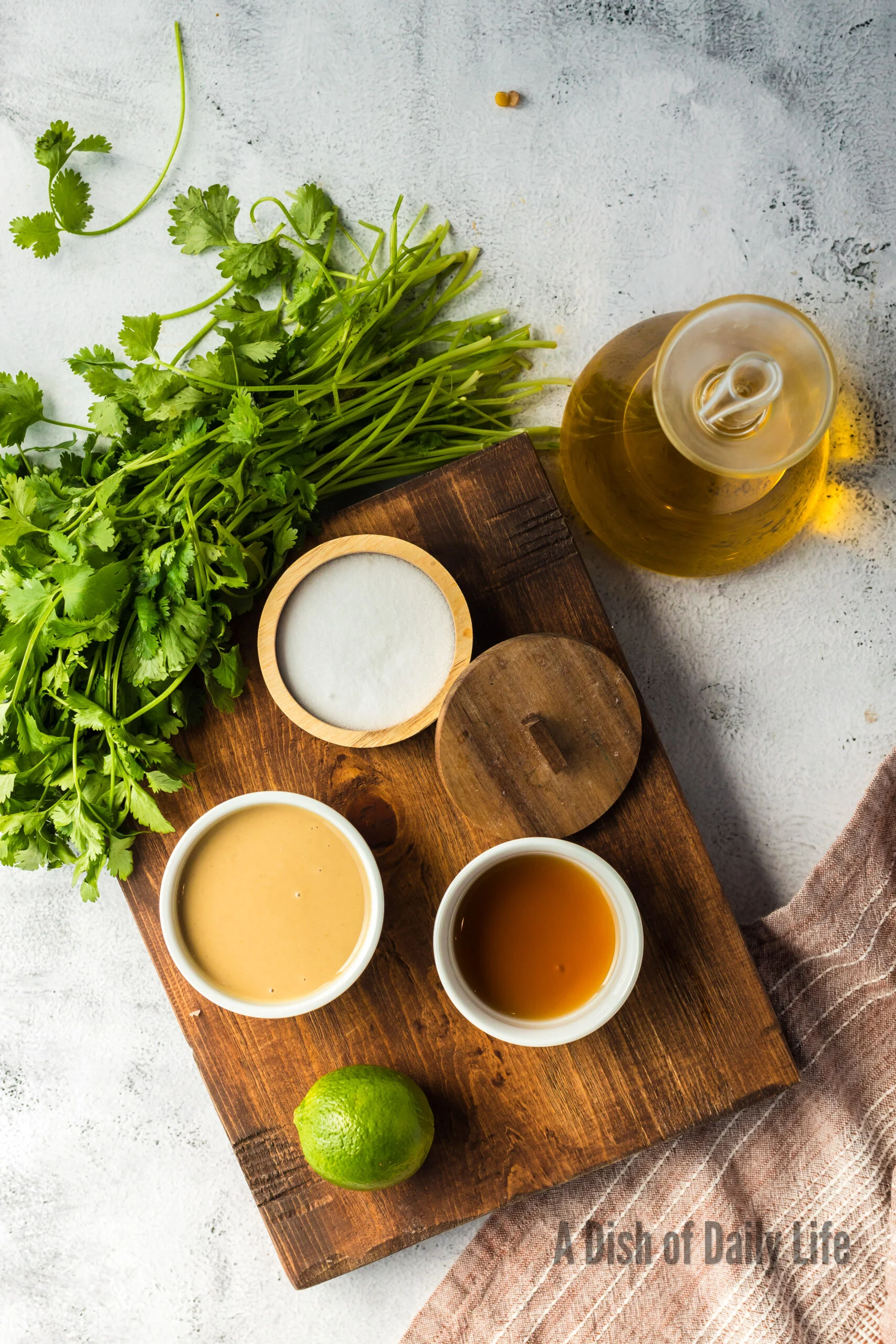 All ingredients for salad dressing laid out on the counter.